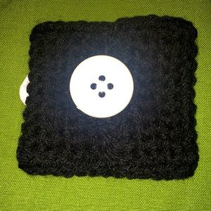 Knit coffee cup cozy.